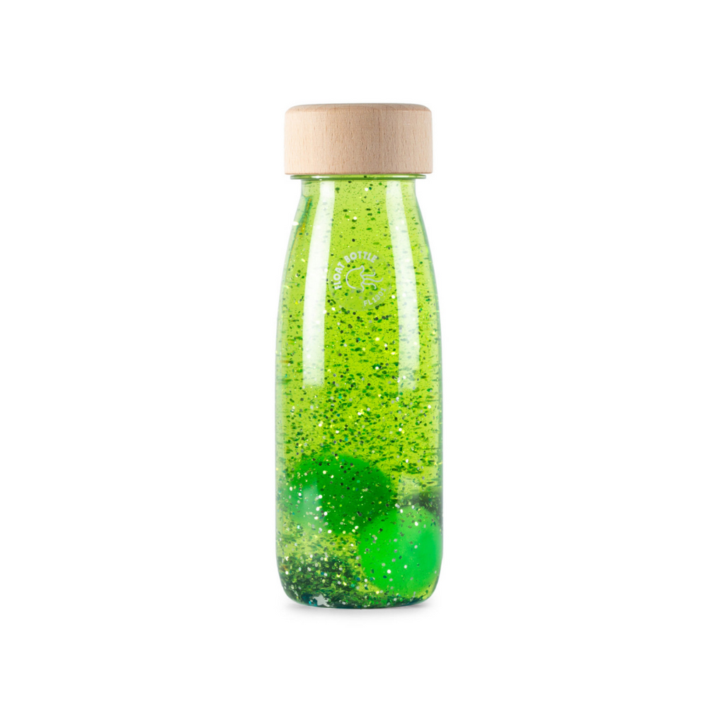 A Petit Boum green sensory float bottle.
